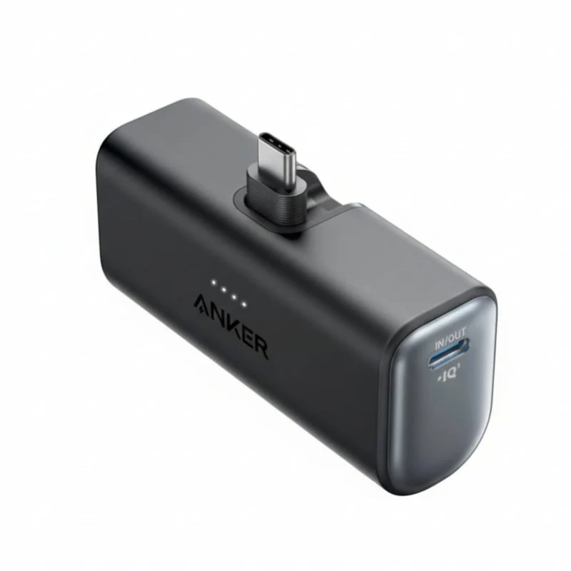 Black Anker Nano A1653 5K power bank with its foldable USB-C connector extended and side USB-C socket visible.