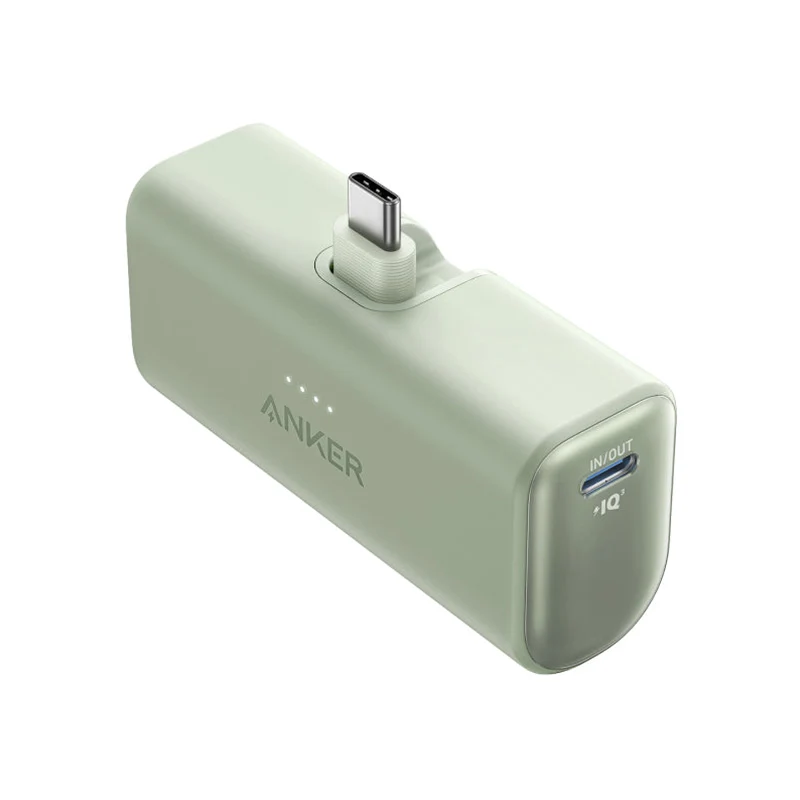 Green Anker Nano A1653 5K power bank with its foldable USB-C connector extended.